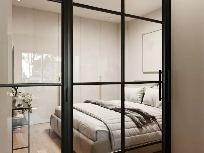 Dormitorio con separación de cristal en el Edificio Filet de Fora