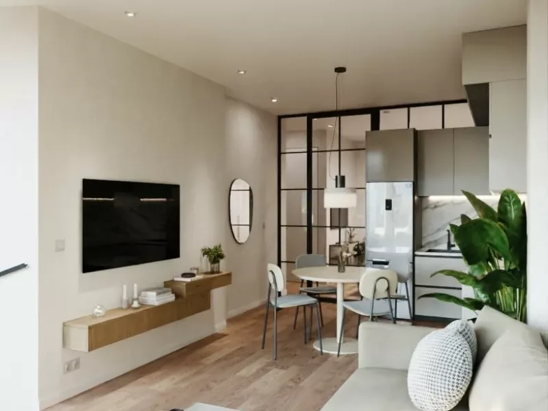 Salón con cocina abierta de una vivienda del Edificio Filet de Fora